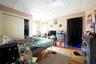 Bedroom featuring a closet, a paneled ceiling, and wood-type flooring