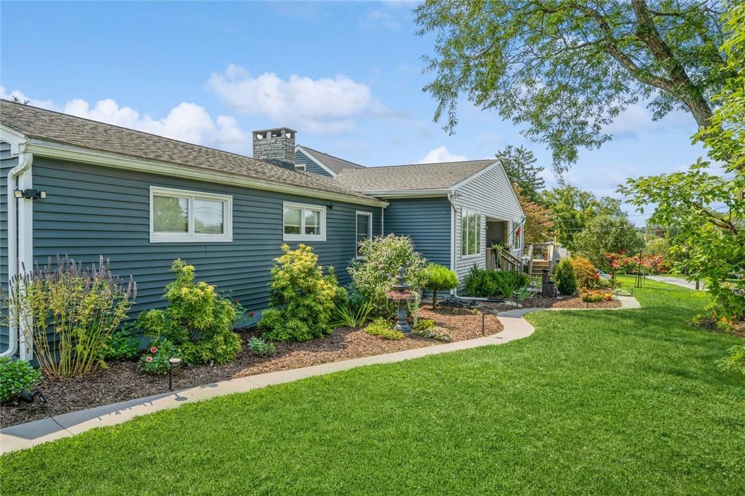 View of home's exterior featuring a yard