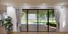 Doorway to outside featuring healthy amount of natural light and recessed lighting