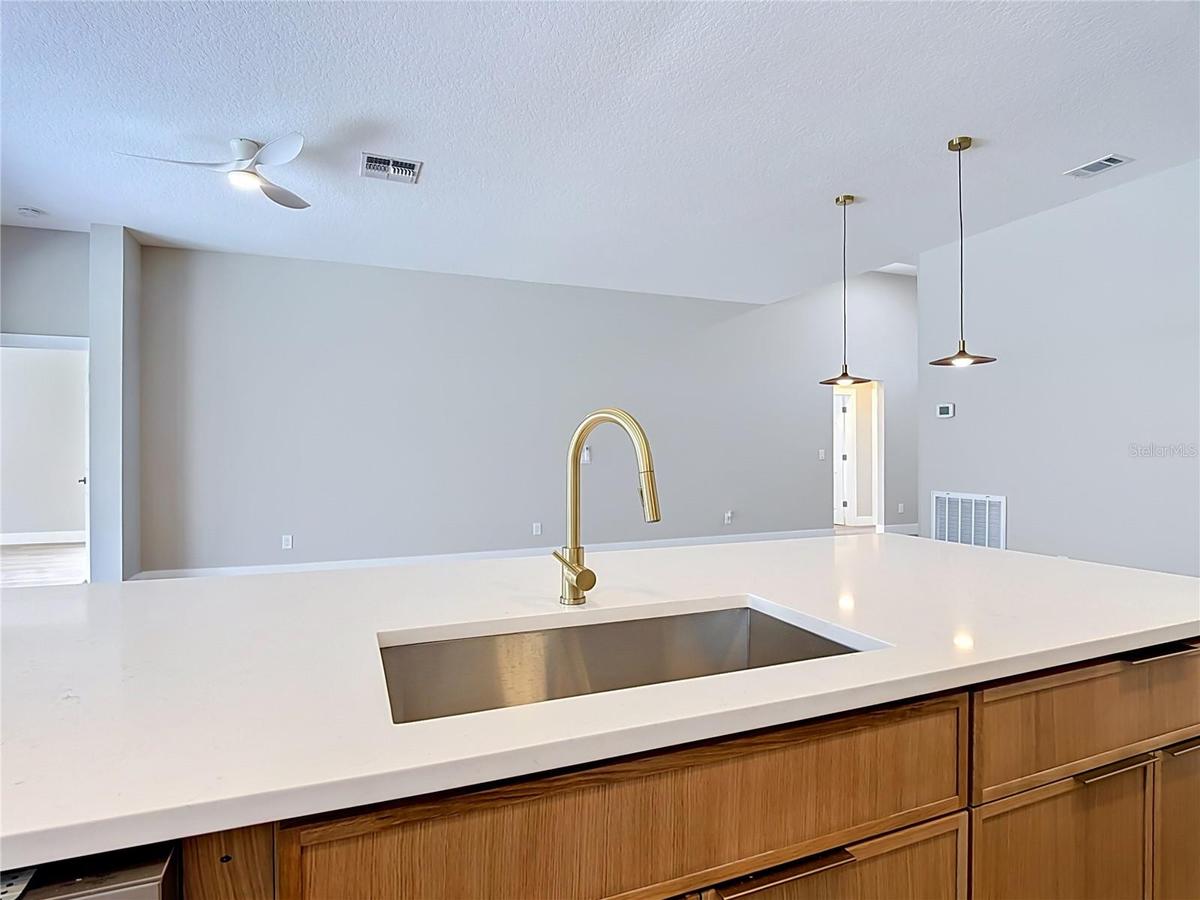 fully renovated kitchen with quartz countertops