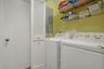 Laundry room with new washer and dryer