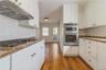 Updated kitchen with breakfast area and drs to side entrance