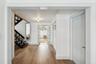 FOYER TO EXTRA LIVING ROOM