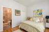 First floor guest bedroom 4 with walk in closet and en-suite....could be an additional primary suite