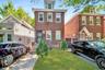 View of front of home with brick siding