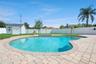 Backyard Oasis with Pool/Storage Shed and Fenced-In Backyard