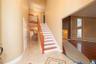 Grand entry leading to Living room, back of the house or the upstairs where the 4 Bedrooms and 2 full bathrooms are located.