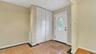 Entryway with visible vents and baseboards
