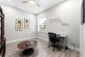 Main-floor bedroom with its own full bath flexes perfectly as a home office, in-law suite, or private retreat for visitors