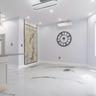 Empty room with recessed lighting, finished concrete floors, and a wall mounted AC