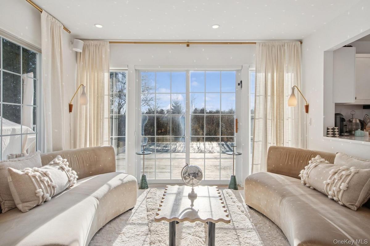 Living room featuring healthy amount of natural light