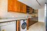 Wsher and dryer inside the kitchen