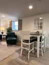 Dining room featuring recessed lighting and wood finish floors