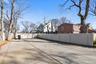 Fenced backyard featuring a residential view