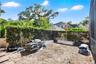 In addition to a spacious backyard, there is also a private garden area off of the pool.