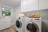 Inside laundry room with utility sink