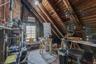 Attic accessed by upper units