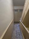 Hall with a wainscoted wall