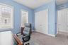 Double built-in closet with more storage across the hallway.