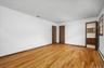 Primary Bedroom with Ensuite Bath and Walk-in Closet