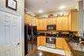 Kitchen with build in pantry closet.