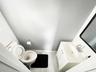 Bathroom with vanity and light tile patterned flooring