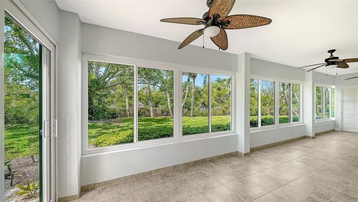 Sundrenched lanai includes hurricane impact sliders with a nice private view of the lagoon.