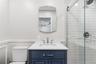 New primary bathroom with moldings