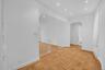 Dining area leading to primary bedroom and bathroom.