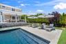 Swimming pool with a patio area
