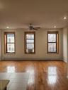Spare room with cooling unit, recessed lighting, baseboards, hardwood / wood-style flooring, and a ceiling fan