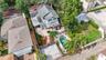 From above, the property’s private outdoor spaces and convenient rear access come into full view.