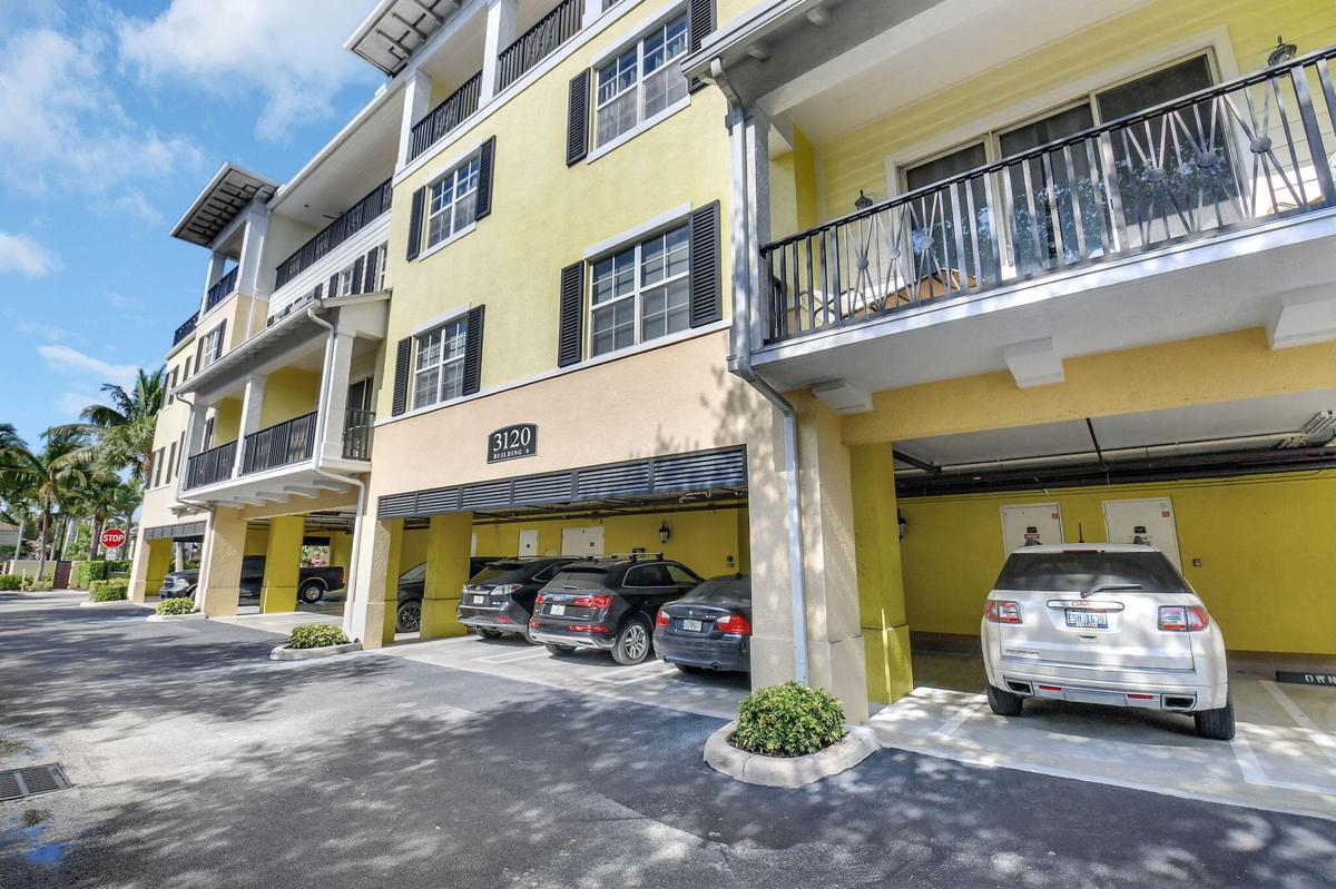 Covered carport conveniently located near lobby entrance!