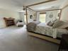 Spacious Primary with fireplace, large walk in closet.  Primary bath with soaking tub, shower and double sink vanity