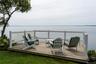 Terrace featuring a water view