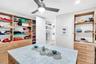 Owners Suite Walk-in Closet with Built-ins