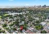 Aerial views highlight the home’s exceptional location near Crescent Lake Park, with downtown St. Petersburg and the waterfront just beyond.