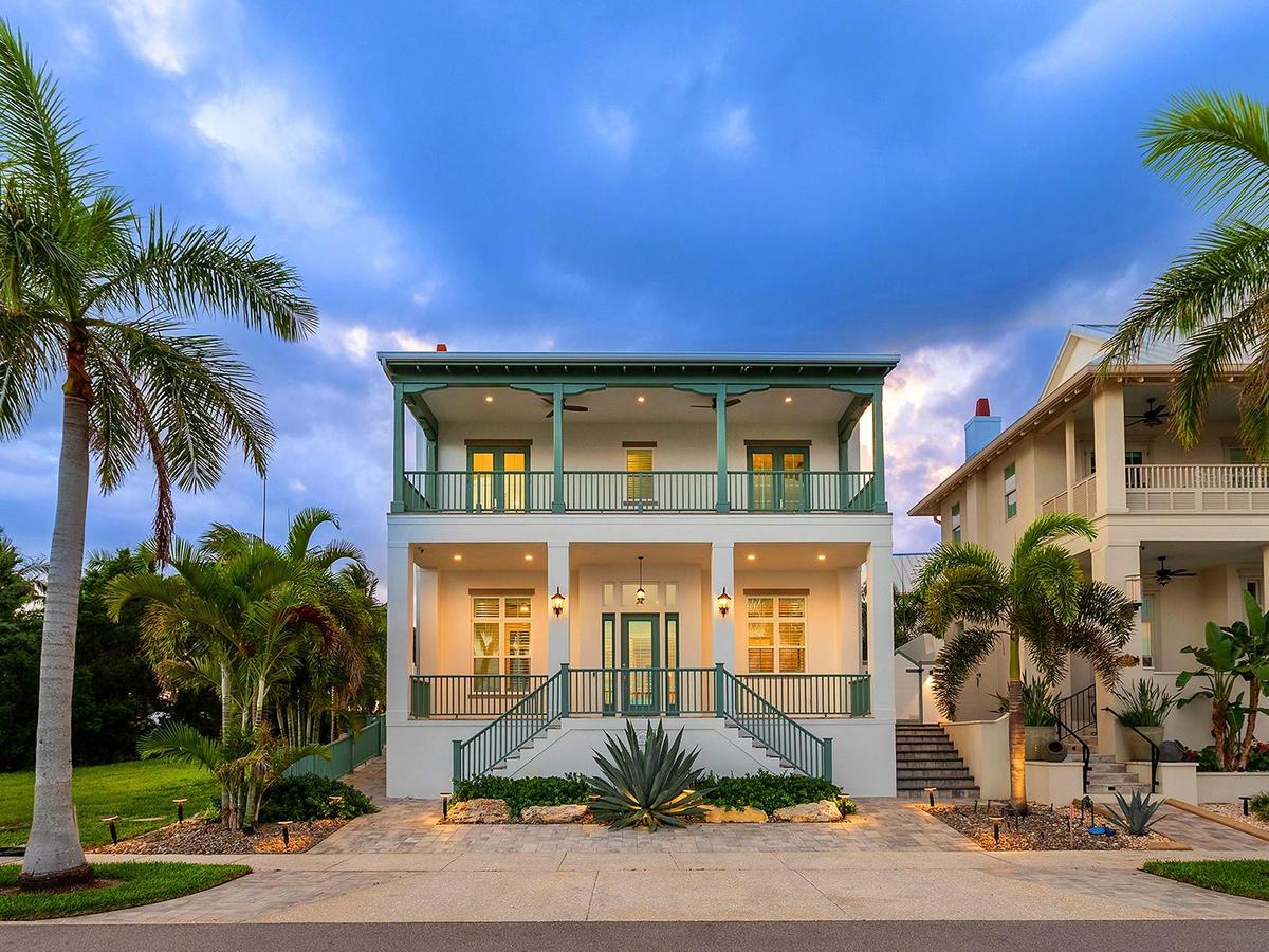 Deeded dock with 12,000 lb. boat lift, 2026 elevated seawall, and the largest lot with a home in the quiet enclave of Redfish Cove