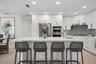 Kitchen with Breakfast bar island and stainless appliances
