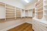 Custom walk-in closet in Primary bedroom suite