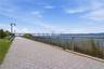 Steps from the scenic Hudson RiverWalk, offering beautiful waterfront views and outdoor recreation.