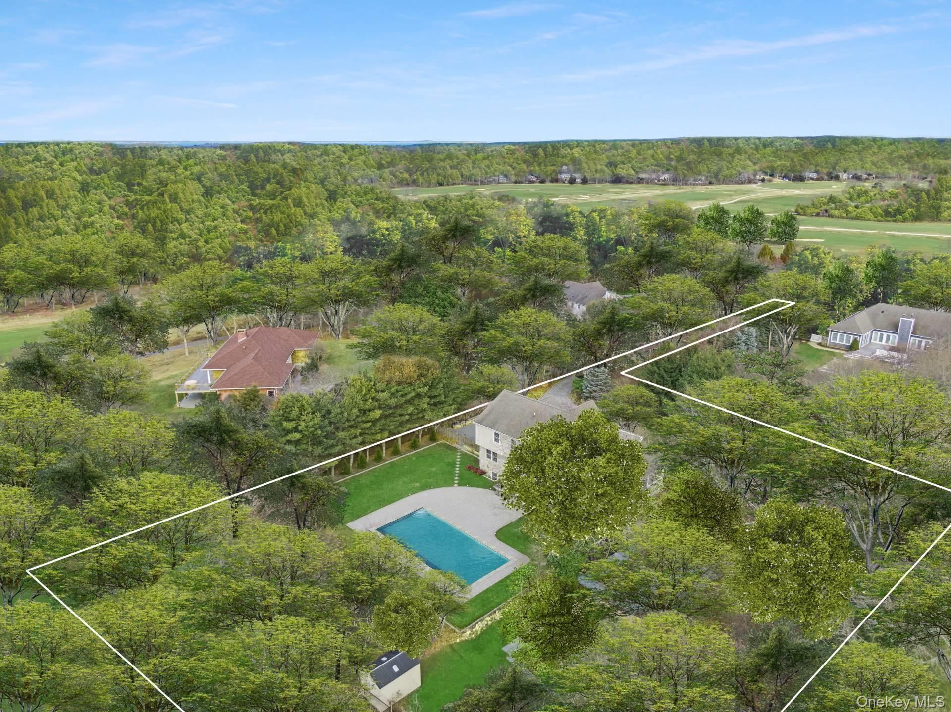 Aerial view of property's location with a pool and property boundaries highlighted