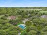 Aerial view of property's location with a pool and property boundaries highlighted