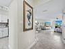 This home is all done up in seaside hues and is being offered turn-key furnished!