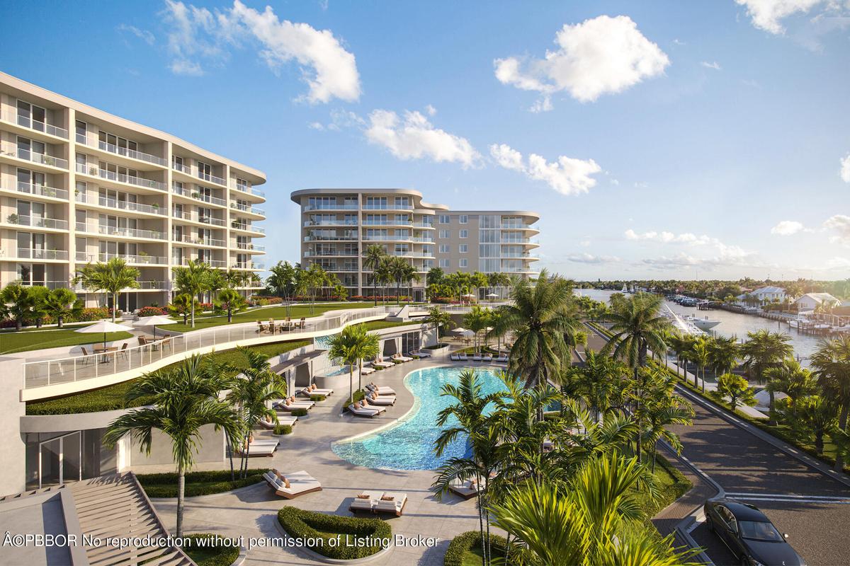 South view of amenities from including cabanas (some available for purchase) 95 foot lap pool and marina.