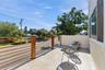 Spacious second-floor balcony off the upstairs bedroom offering bonus outdoor living space