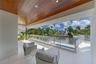 The second floor features a private patio in front of the master bedroom