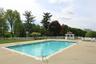 View of swimming pool with a gazebo and a patio area