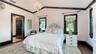 Bright guest bedroom with elegant finishes