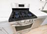CUSTOM DESIGNED QUARTZ COUNTER WITH UNDERMOUNTED  STAINLESS STEEL COMMERCIAL  SINK
